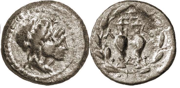 Lakedaemon, Laconia, AE 19, 35-31 BC. Jugate busts of the Dioscouri to right, wearing laureate pilei, stars above their heads / Λ-A across upper fields, Δ-A across lower fields, two amphorae entwined by serpents, all within olive wreath. BMC 37; Grunauer series XV.