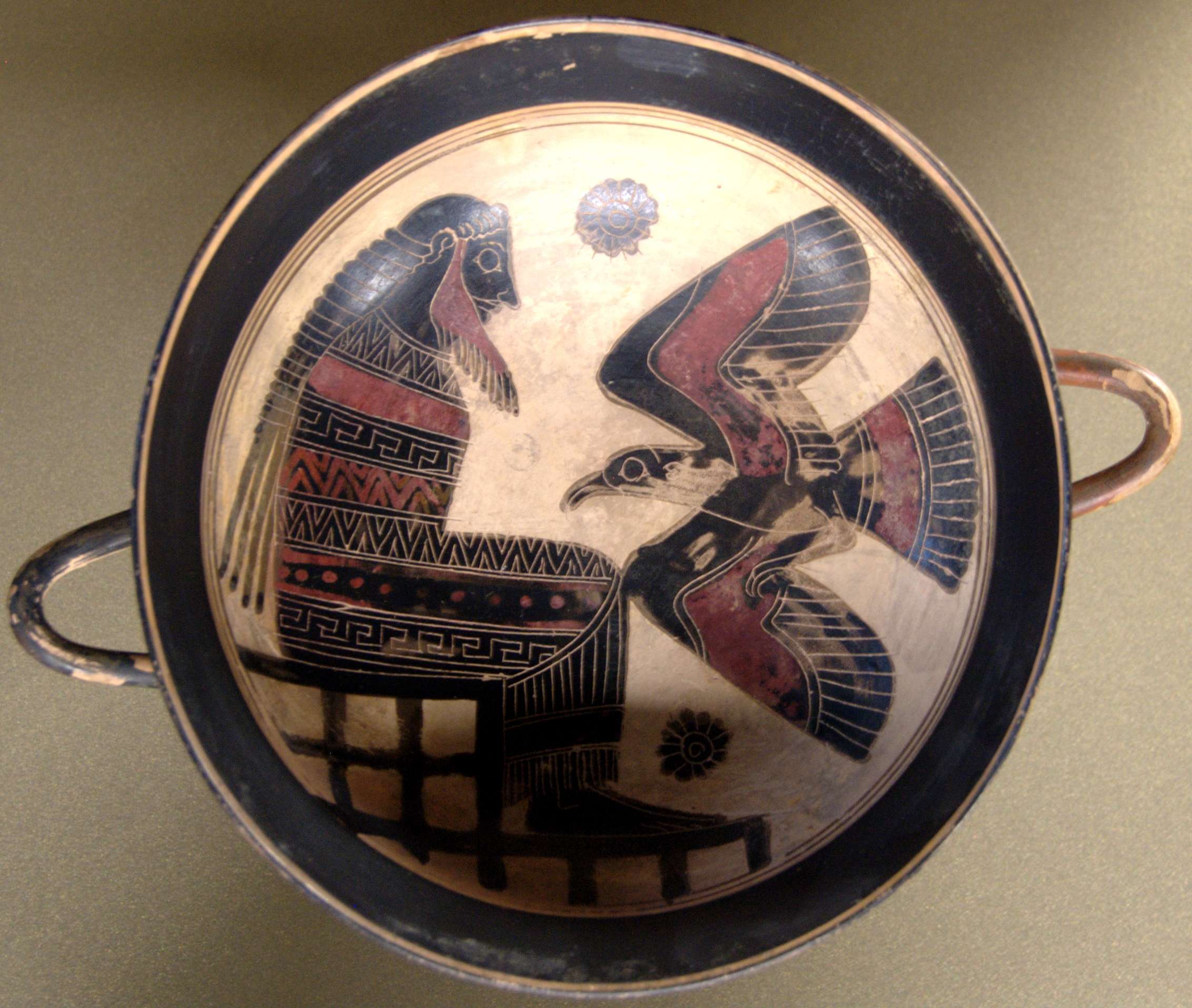 Ο Ζεύς με τον αετό. Zeus with eagle. Tondo from a black-figured Laconian cup, ca. 560 BC.