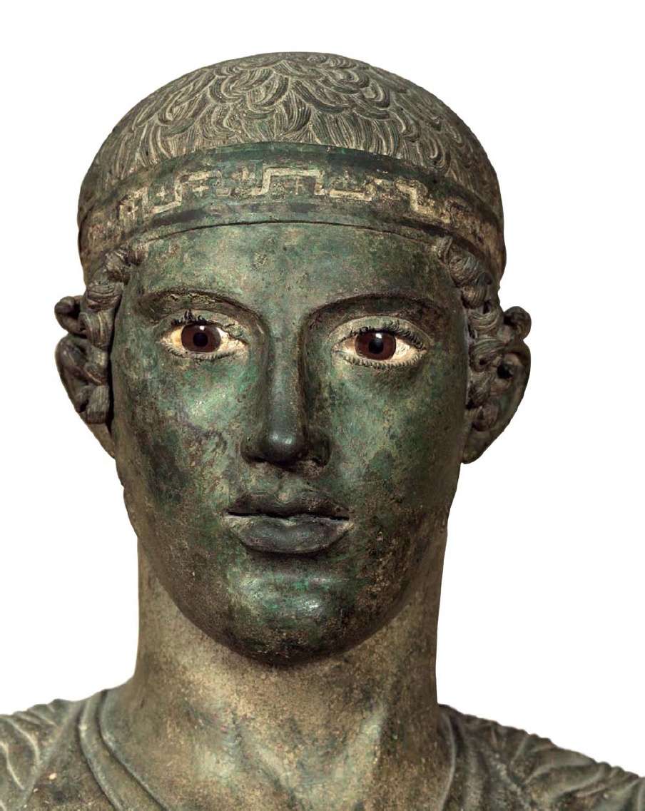 Το κεφάλι του Ηνιόχου, του νέου που οδήγησε στη νίκη το άρμα ενός άρχοντα της Σικελίας. 470 π.Χ. Αρχαιολογικό Μουσείο Δελφών.